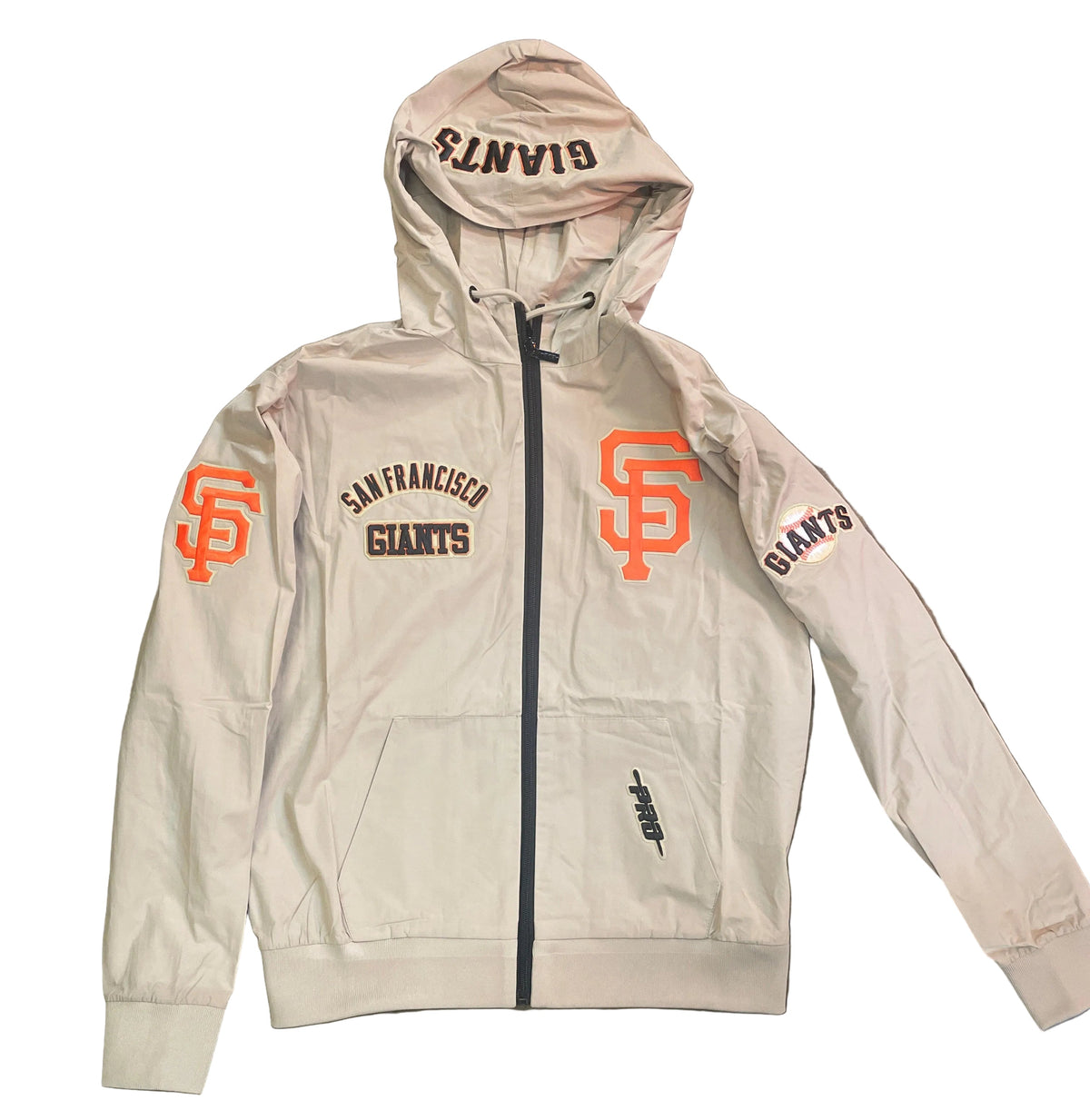 A San Francisco Giants zip-up hoodie in a light beige color, laid flat . The hoodie features orange and brown logo graphics on the chest and sleeves, with 'GIANTS' printed on the hood.