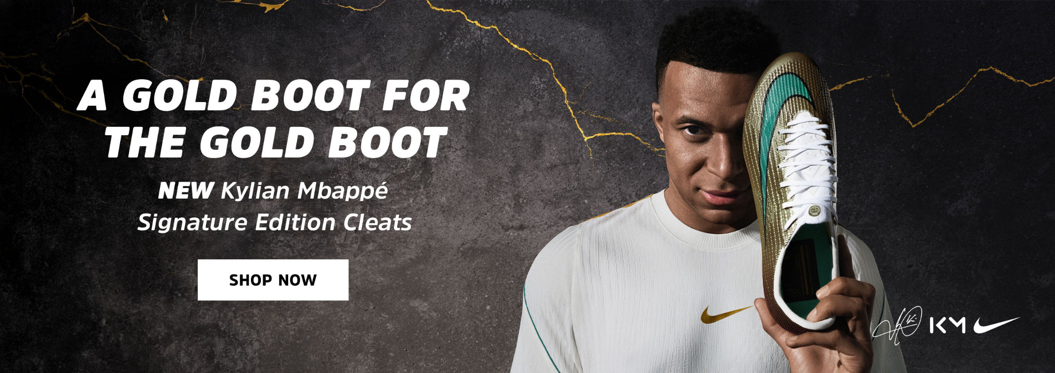 A promotional banner featuring a model holding a Nike cleat with a gold foil boot cover. The background is dark gray with gold lightning-bolt graphics, and the text reads 'A GOLD BOOT FOR THE GOLD BOOT' and 'NEW Kylian Mbappé Signature Edition Cleats'.