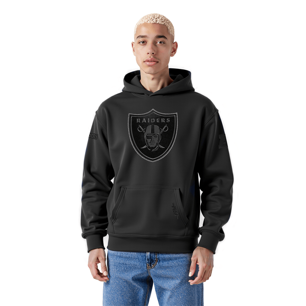 Pro Standard Men's Las Vegas Raiders Blackout Drop Shoulder Fleece Pullover Hoodie - Black, model front view