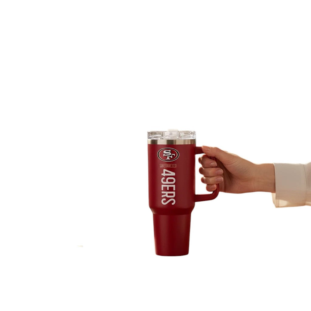 Coliseum Sports San Francisco 49ers 40 oz red stainless steel tumbler with handle and flip straw held by a hand
