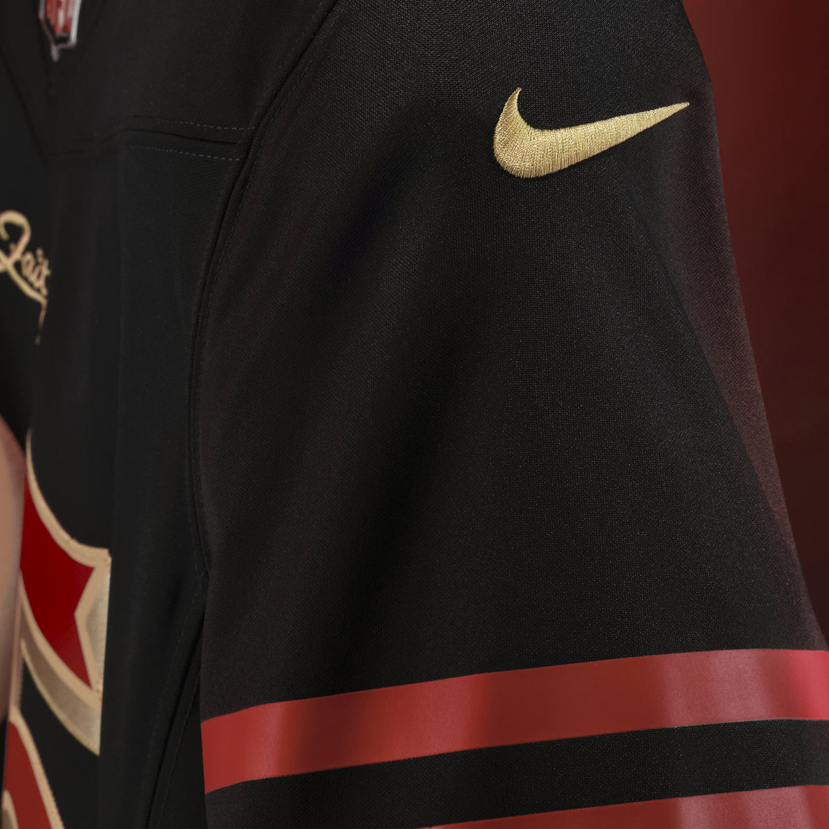 Nike men's Brock Purdy #13 San Francisco 49ers Rivalries Limited jersey in black, gold Nike Swoosh and striped sleeve detail