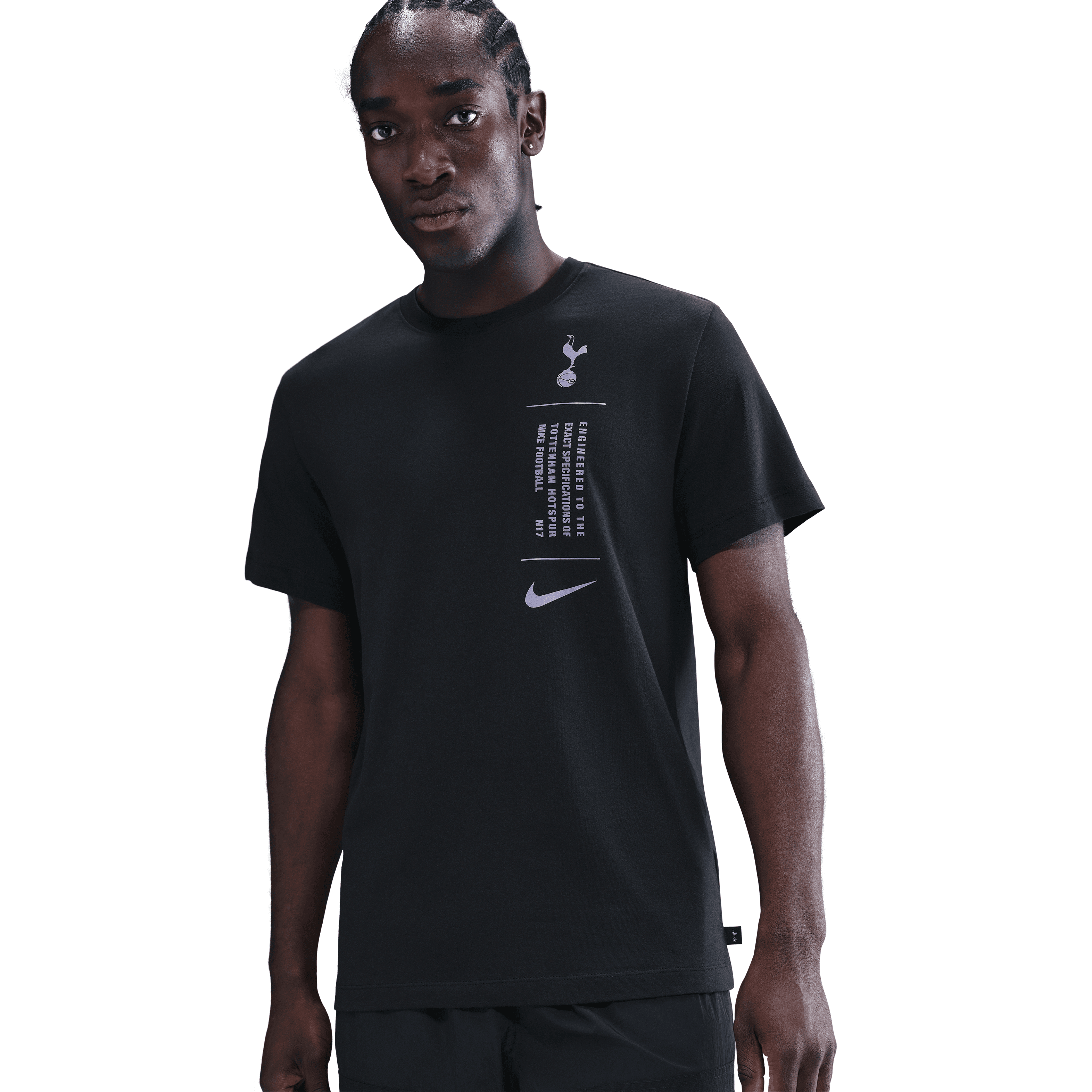 Person wearing a black Nike t-shirt with a logo on a white background
