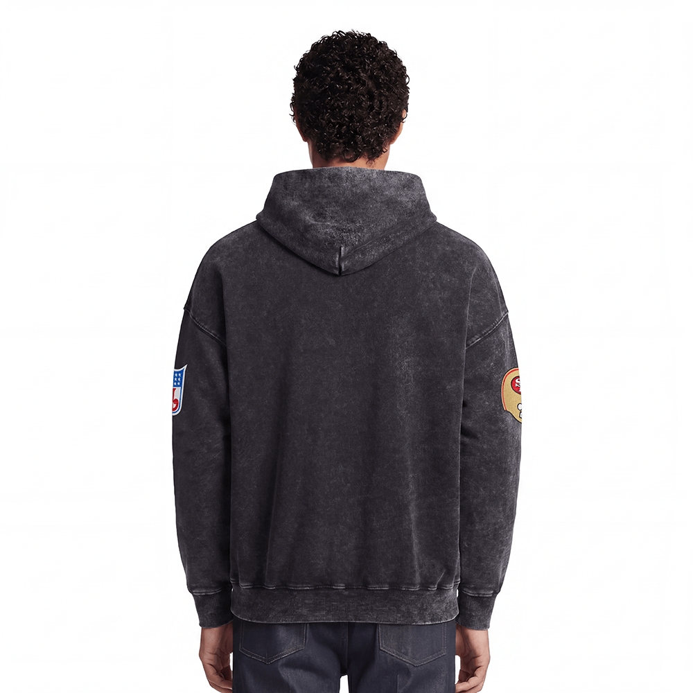 Pro Standard Men's San Francisco 49ers First Team Enzyme Wash Drop Shoulder French Terry Pullover Hoodie - Washed Black, model back view
