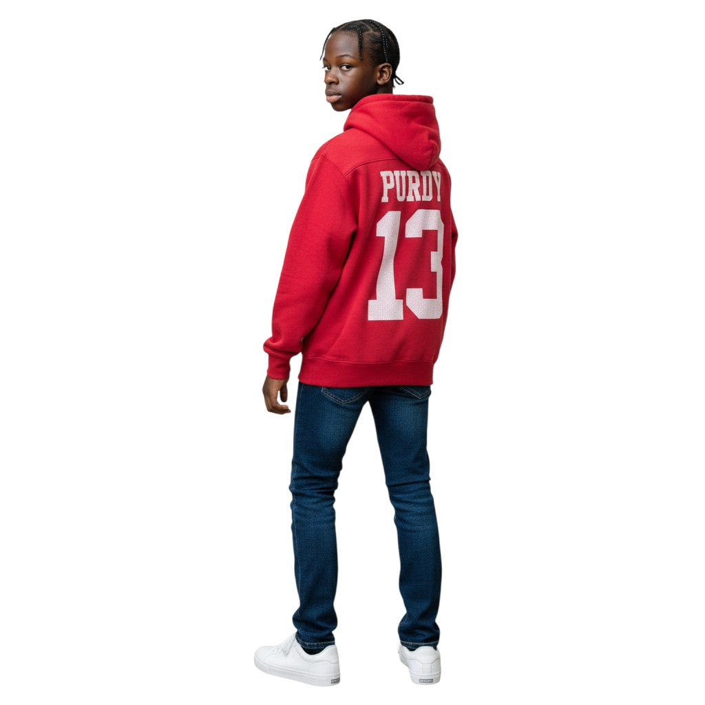 Coliseum Sports youth red Brock Purdy 13 San Francisco 49ers fleece hoodie worn by a young man from behind